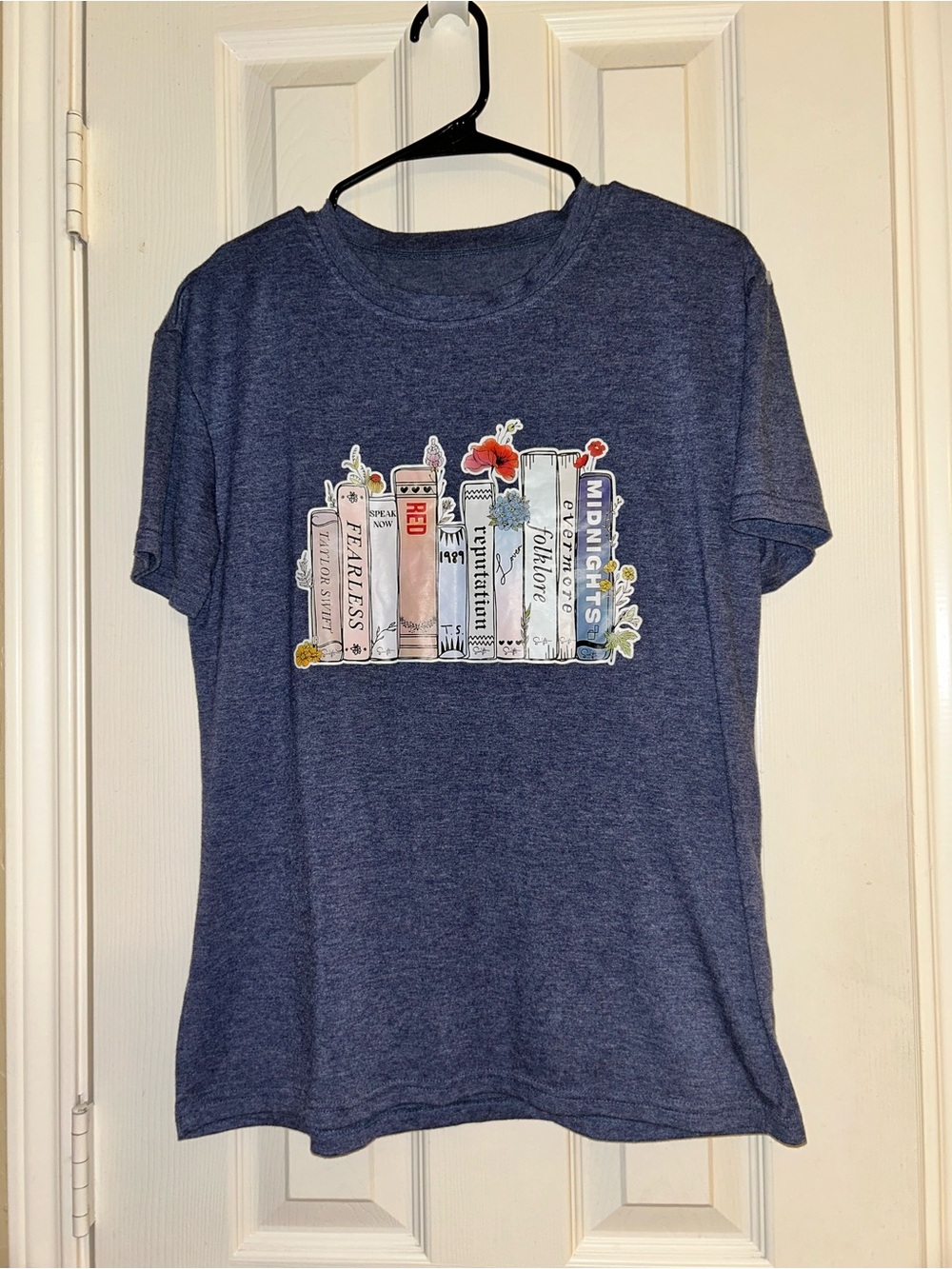 NWOT Ladies Size Medium Taylor Swift Albums Books Heathered Blue T-Shirt
